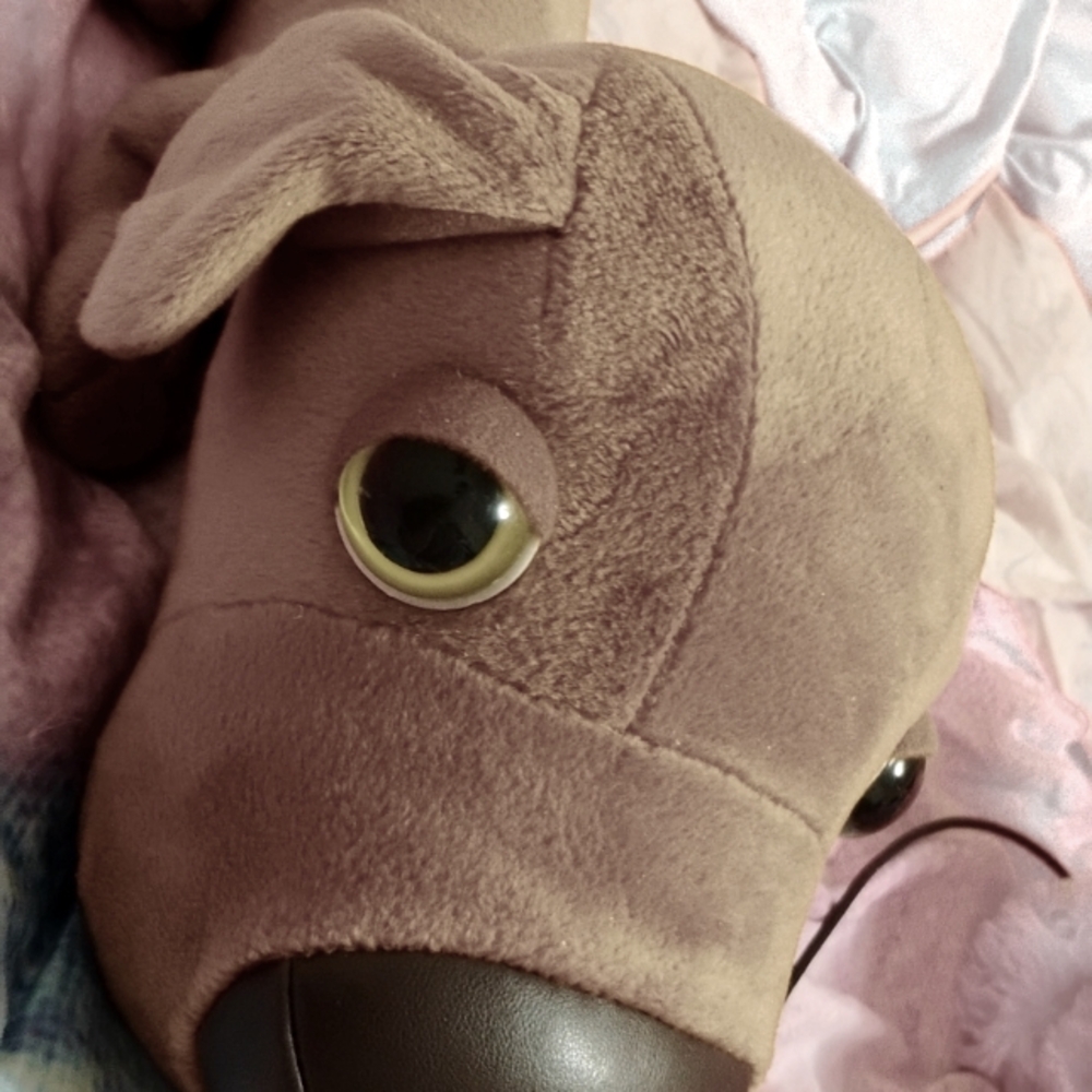 I'm selling a dog by a stuffed animal